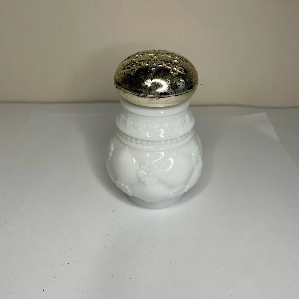 Avon milk glass powder dispenser ( empty) Vintage